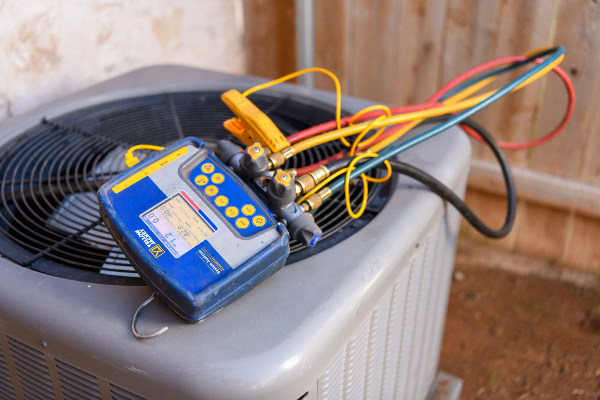 Technician reviewing a furnace system on a tablet